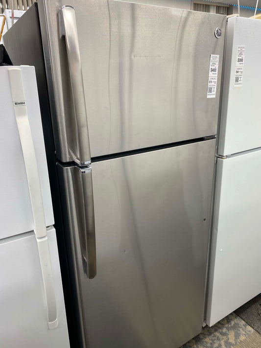 ITEM: #RF393  GE top freezer Stainless steel refrigerator  28 inc